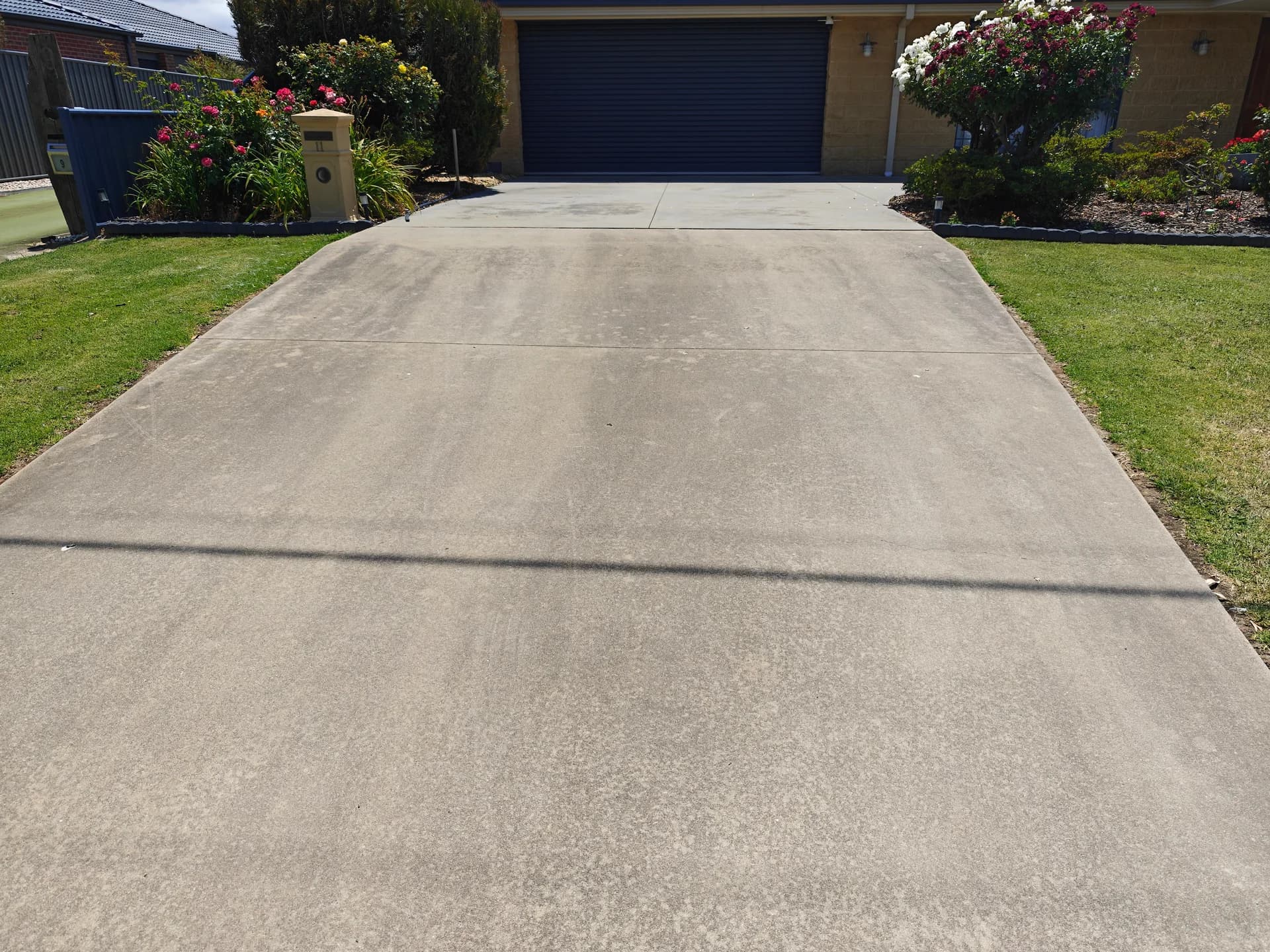 Drive way clean before pressure washing